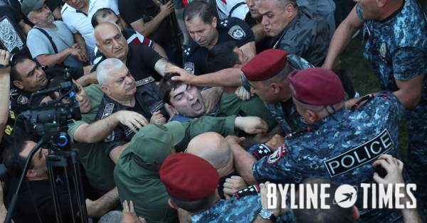 Police blocked the way to protesters during a rally against Prime Minister Nikol Pashinyan in Yerevan, Armenia, on 12 June. Photo: Associated Press / Alamy